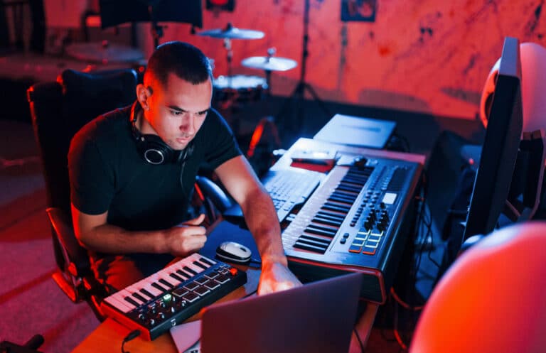 Musician Working in a Music Business Capacity (inside a recording studio)
